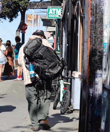 Patrick Bral continues his walk down Haight Street with most of his belongings strapped to his back on Saturday, June 25, 2016. 